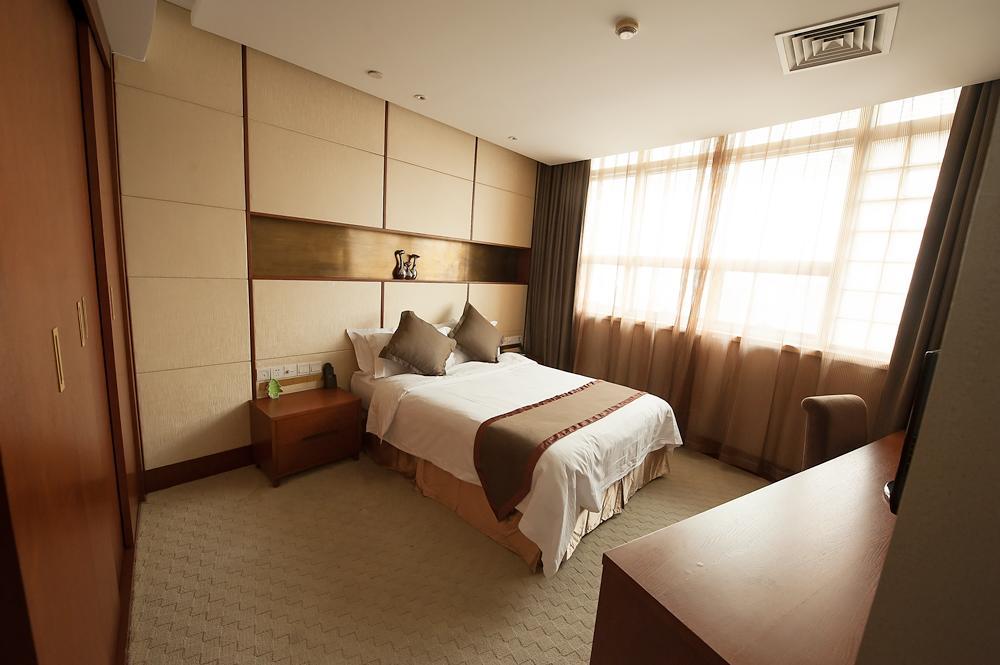 Noble Center Hotel Shanghái Habitación foto
